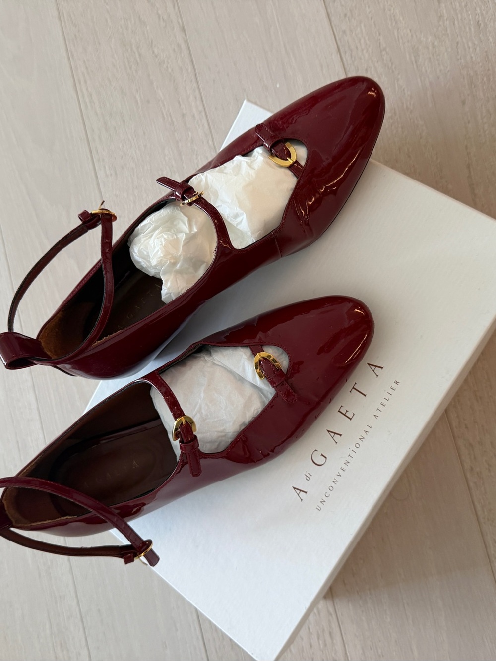Glossy burgundy leather flats Adigatea